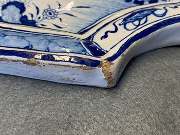 A Dutch Delft blue and white chinoiserie plaque, 18th C.